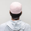 Back view #7965 Straight Peek-A-Boo Halo shown in (2) Darkest Brown with #9114 Cotton Knit Baseball Cap in Pink Pearl