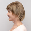 Side view #8533 EverYou™ Carrie Wig shown in (14) Light Brownish Blonde