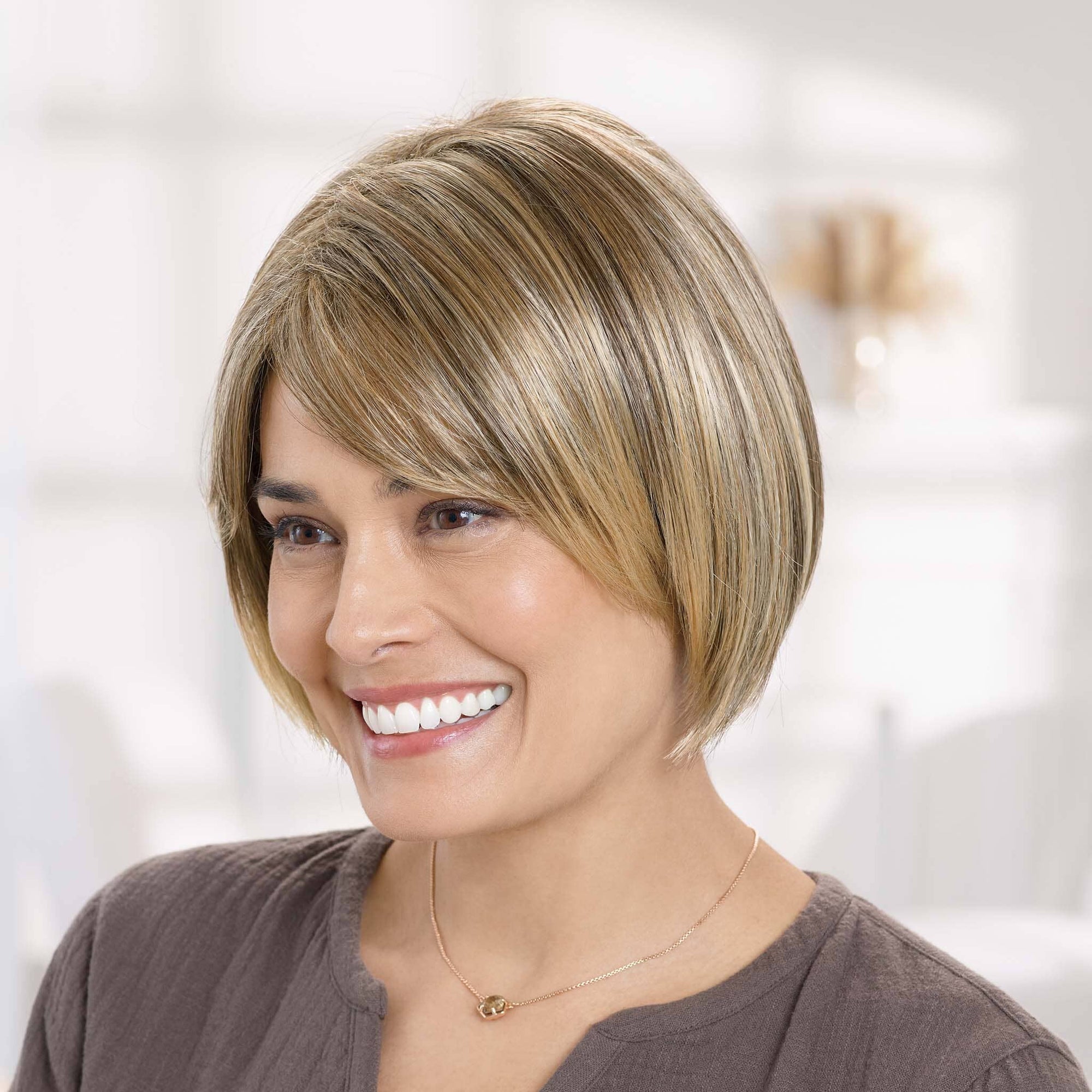 Front view #8538 EverYou Serena Wig shown in (#811) Mocha with Golden Highlights