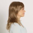 Side view #8549 EverYou™  Violet Wig shown in #14 Light Brownish Blonde.