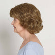 Side view # 8564  EverYou Nora Wig shown in #14 Light Brownish Blonde.