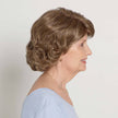 Side view # 8564  EverYou Nora Wig shown in #14 Light Brownish Blonde.