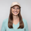 Front view #9151 Long Wig with Beige Hat shown in (12AH) Golden Brown with Light Auburn Highlights