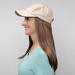Side view #9151 Long Wig with Beige Hat shown in (12AH) Golden Brown with Light Auburn Highlights