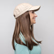 Side view #9151 Long Wig with Beige Hat shown in (12AH) Golden Brown with Light Auburn Highlights