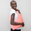 Side view #9947 Mastectomy Pillow shown in Coral