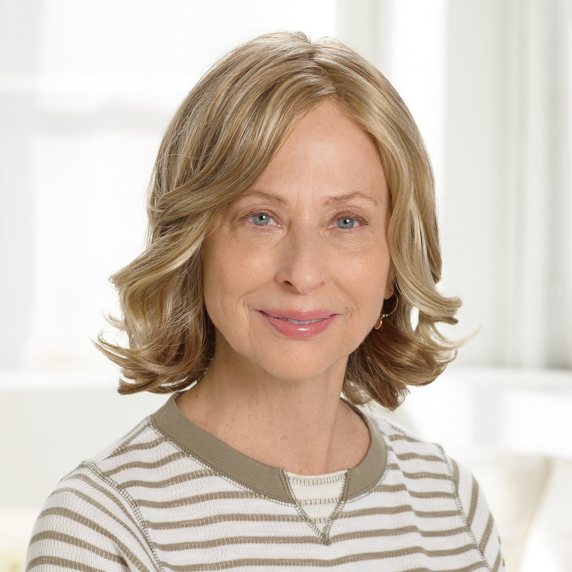 Front view #9955 EverYou™ Hillary Wig shown in (1316100) Blonde to Brown Highlights