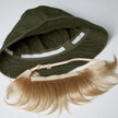 Bangs attach to hat with Velcro Strips (included).