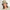 #8372 Halo with Side Bang by EverYou shown in (829) Sunkissed Brown with Distressed Cotton Bucket Hat (#9503) in Khaki 