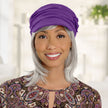 #8374 Mid-Length Halo with Bang by EverYou shown in (5660) Light Frosted Grey with 100% Cotton Newsboy with Mini Rosettes (#9674) in Purple 