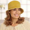 Front view #9503 Distressed Cotton Bucket Hat Shown in Yellow with Shoulder Length Curly Halo (#8059 ) in (29) Glazed Strawberry