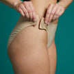 High Waist Brief with hook fasteners. Shown in beige.