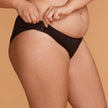 Brief Panty with hook fasteners. Shown in black, side view.